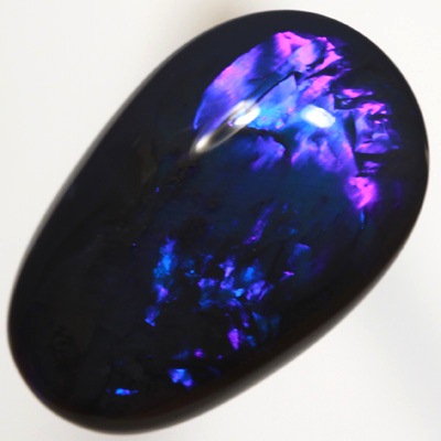SOLID BLACK OPAL Bright electric blue roling flashes SEE VIDEOS